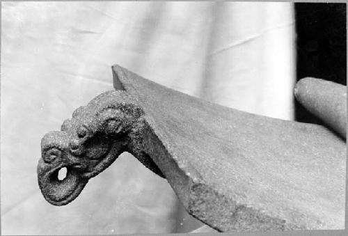 Tripod metate with head, accompaning mano