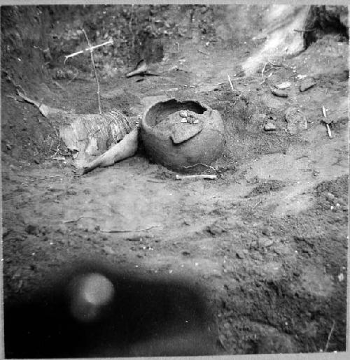 Test pit. Vessel F. Coarse reddish ware. Mouth 27 cm, max 33 cm, ht. 21 cm.`