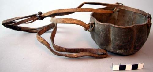 Metal bowl with leather straps