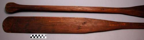 Paddle. One of three with birch bark canoe