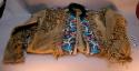 Hide coat, possibly Winnebago. Fringed. Beaded panels of floral designs done on