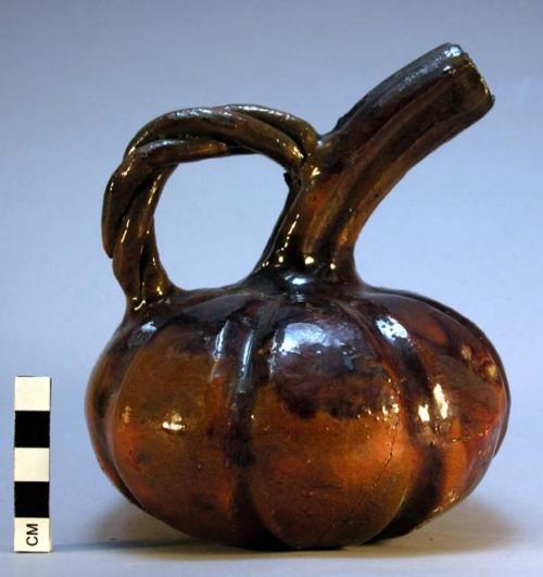 Pumpkin shaped pottery vessel, broken