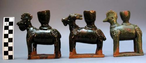 Animal effigy candlesticks.  green glazed red ware.  11.5 x 11.5 x 4.5 cm. (all