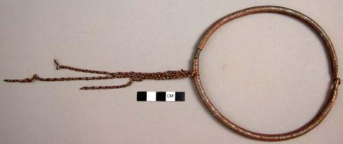 Iron neckring bound with twisted iron wire and with chain pendant