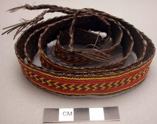 Basketry belt - brown with red and yellow designs