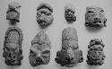 Figurine heads (8), red-brown, unslipped