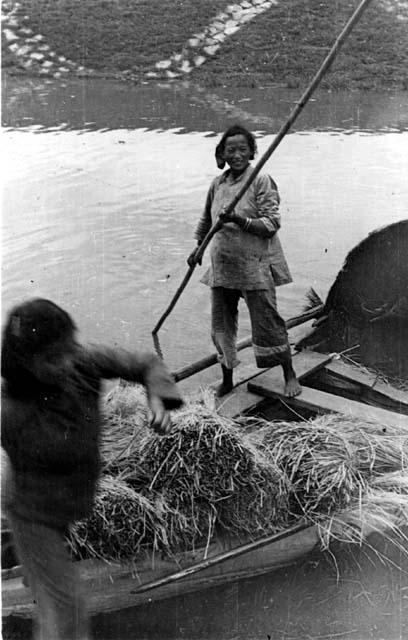 Woman rowing a boat