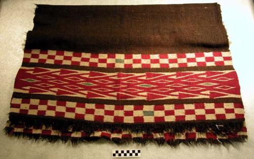 Blanket with fringe (36" x 63"). Central section, twill in brown; border, interl