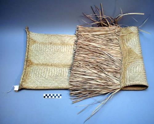 Large mat of buriti frond straw