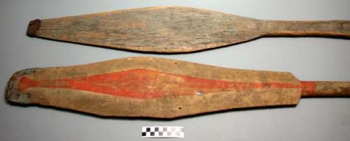 Canoe paddles of pine wood. Each is a different shape.