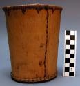 Birchbark containers, one has etched floral motif