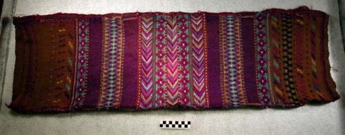 Huipil, 2 pieces. brown with blue, yellow, green, purple design embroidered. 110