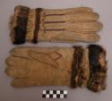 Pair of fur-lined gloves