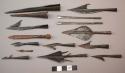 Spear heads, iron, ovate and conical, some barbed, socket ends, some with fiber