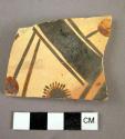 Potsherd showing flower?