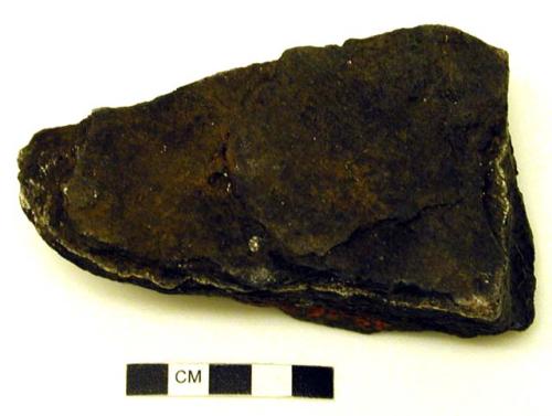 Hammer stone used by chimpanzees to crack nuts