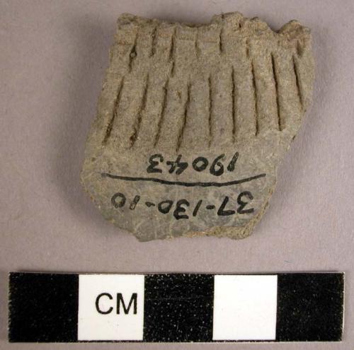 Grey ware potsherd with incised decoration