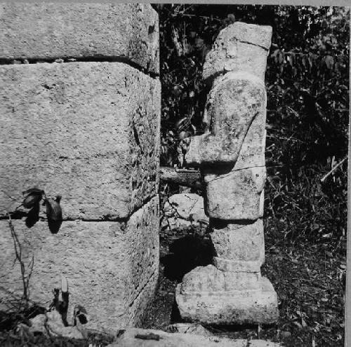 2C1. 4 views of a small statue found near the base of the column.