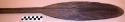 Carved wooden paddle - typical in design of paddles of this section