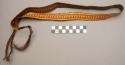 Wide basketry belt with slits at sides - brown with red & yellow design