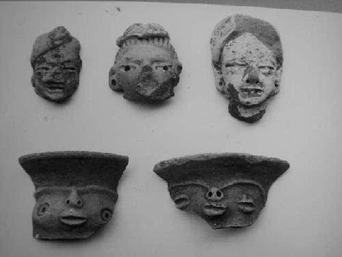 Figurine heads (3); jar face - necks (2)