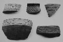 Sherds of Miraflores brown-black standing rim bowls (5)