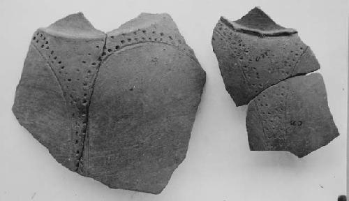 Jar sherds with incised and punctate decor.