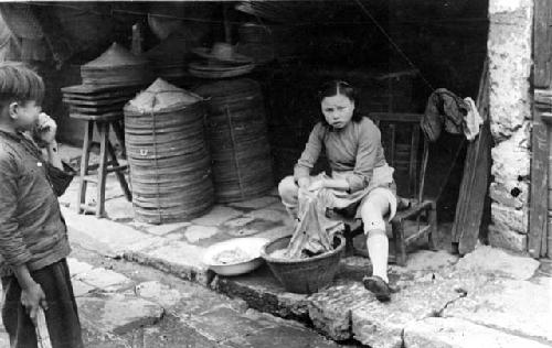 Girl washing clothes