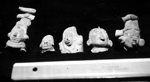 Junuta Figurine heads: small pox types, Orange paste with many sandy inclusions