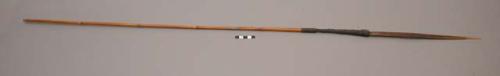 Wooden arrow - broad tip, raffia wrapped around base (46")