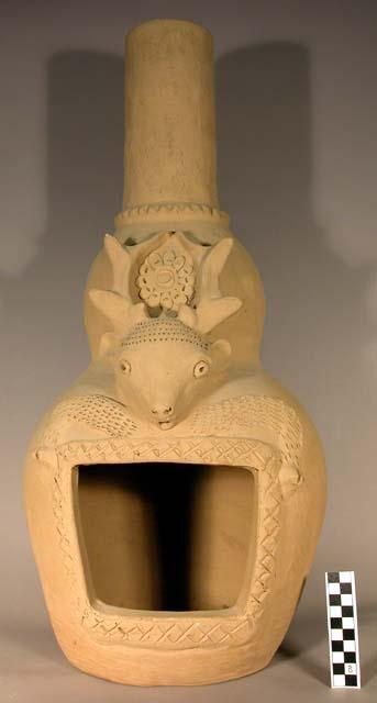 Portable fireplace, "chimenea," with deer in relief