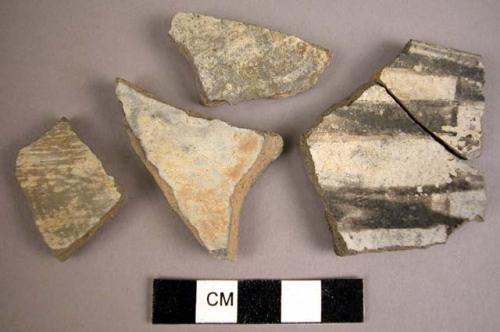 Potsherds, two of which are black-on-white