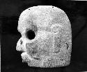 Flat or thin stone head, "hache"