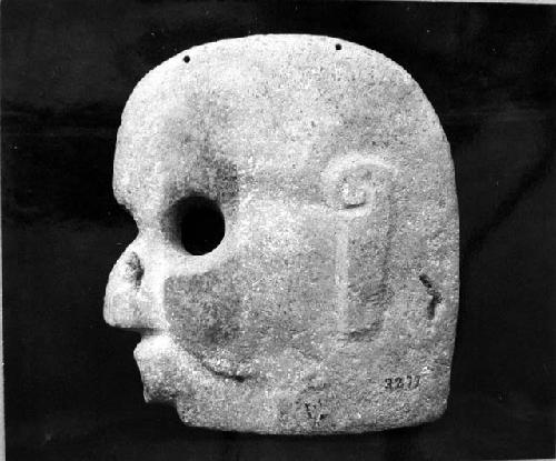 Flat or thin stone head, "hache"