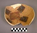 Restorable sherd--part of pottery bowl. Jeddito black-on-yellow