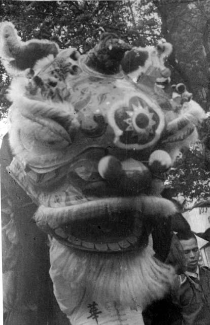 Dragon's head taking part in end of war parade