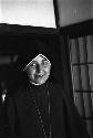 Nun in black habit smiling.