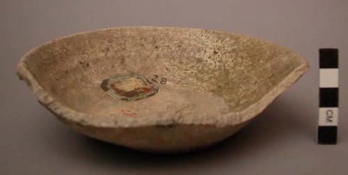 Bowl, ceramic, ring base, sloped sides, slightly flared  rim, broken