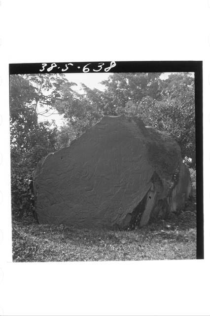 Surface of huge boulder carved in Bas Relief.