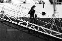 Sister Andre Seiler, Maryknoll nun, walking down ship gangplank