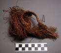 Cordage fragments, braided and knotted vegetable fiber with tassels