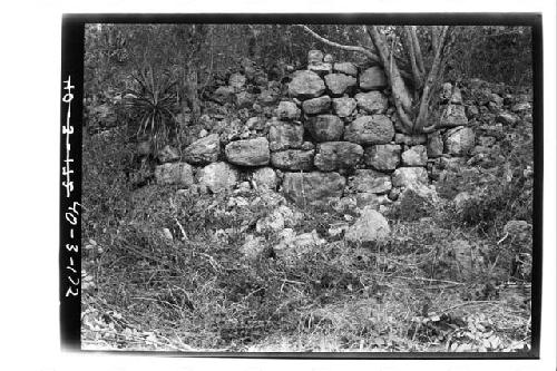 Glyphic band bldg., main lower terrace wall at NE. (SW)?