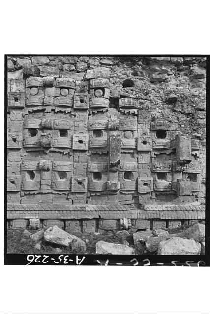 Detail of masks. Structure 2C6 (Casa 1); West facade; Room 7-9