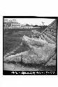 Serpents head at bottom of balustrade of N. stairway of Castillo