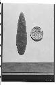 Flint knife and shell disc. Nebaj, Quiche. Knife from Str. 3, Tomb I, #5. Disc f