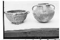 Four-handled pottery vessels #8, left; #9. #8-Ht. 14.5, Lip diam 26.8 cm. Thin,