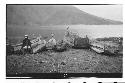 Dugout canoes; Chuitinamit in Background at Foot of Volcan San Pedro