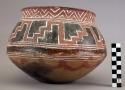 Ceramic, earthenware complete vessel, bowl, polychrome slipped, cord-impressed design