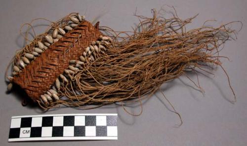 Woven cylinder ornamented with cordage and coix seeds