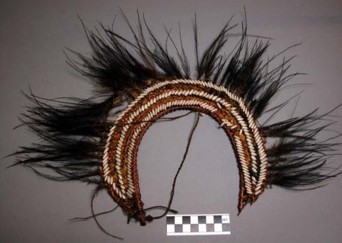 Headdresses, feather corona, woven fiber crescent, seed and fabric applique